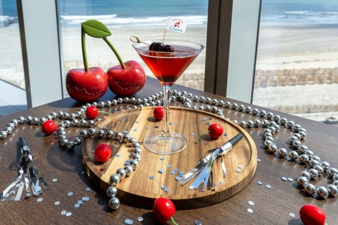 Signature cherry cocktail collaboration at Ocean Casino Resort’s 7th birthday, served with Atlantic City oceanfront views.