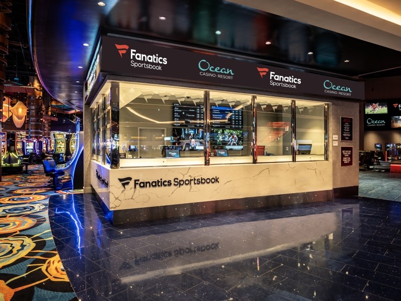 Fanatics Sportsbook at Ocean Casino Resort Atlantic City with betting windows and live odds for pro football games.