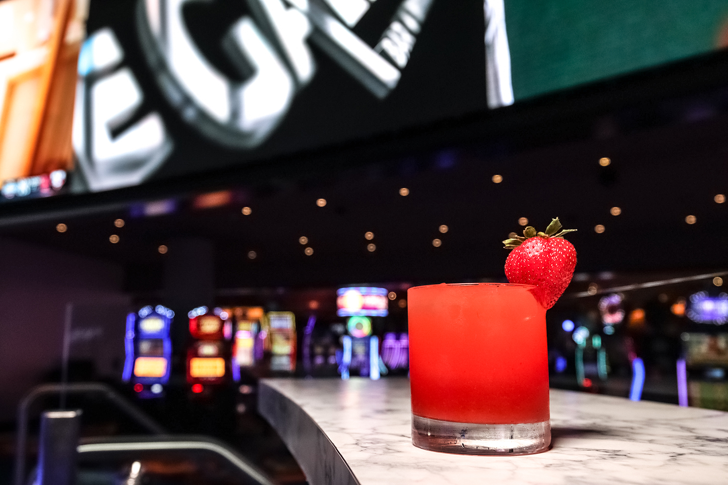 Strawberry-garnished Run It Back cocktail served at Ocean Casino Resort, part of the featured cocktail crawl lineup.