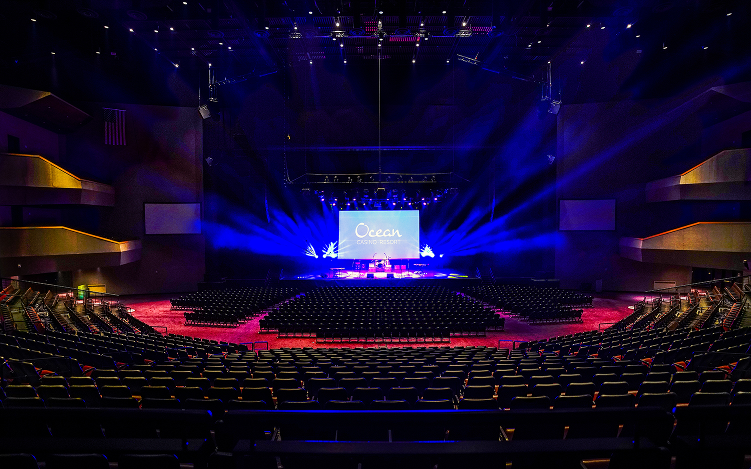Wide view of Ovation Hall at Ocean Casino Resort, showcasing indoor seating and stage lighting for concerts and live entertainment