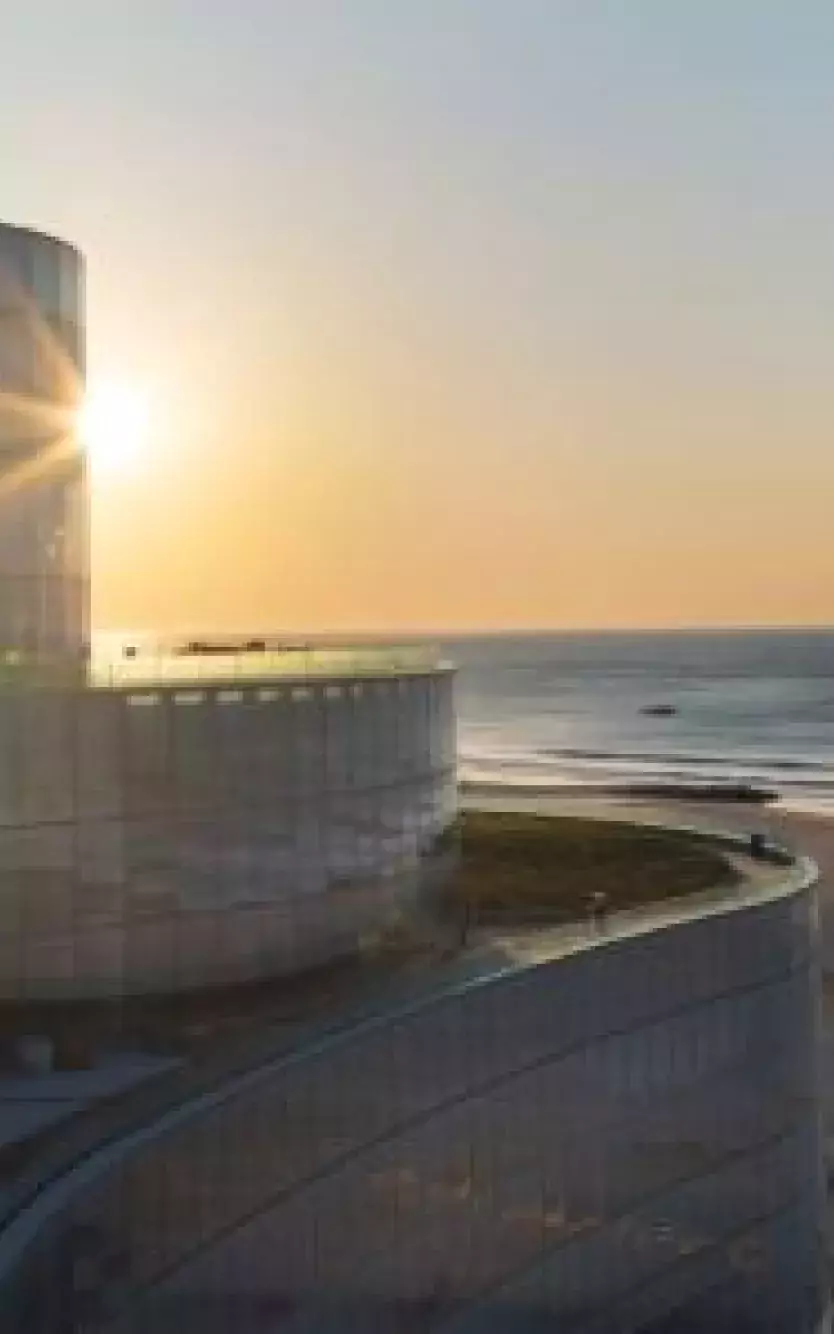 Exterior of Ocean Casino Resort with logos of different charities for Ocean Cares initiatives