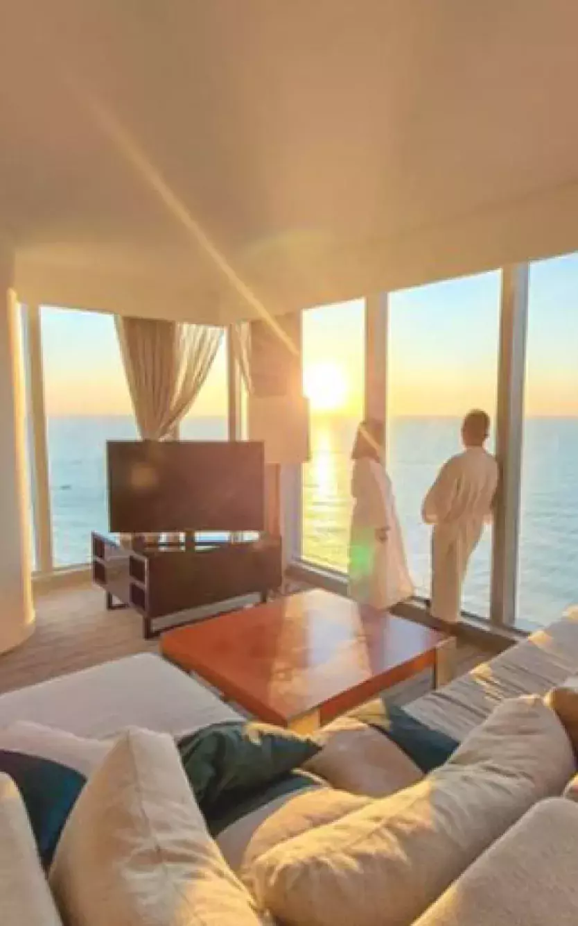 Three-image collage of friends on couch, a couple in the hotel room looking out the window, and an influencer walking up a flight of stairs